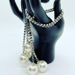 Vintage very unique long lariat necklace with rhinestones and faux pearls.